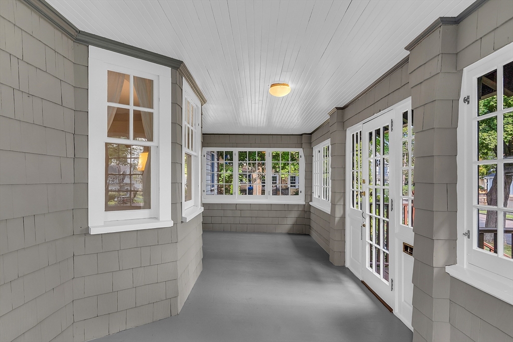 42 Locust Street Marblehead, MA 01945 - Photo 11 of 42 a view of an entryway with wooden floor and windows