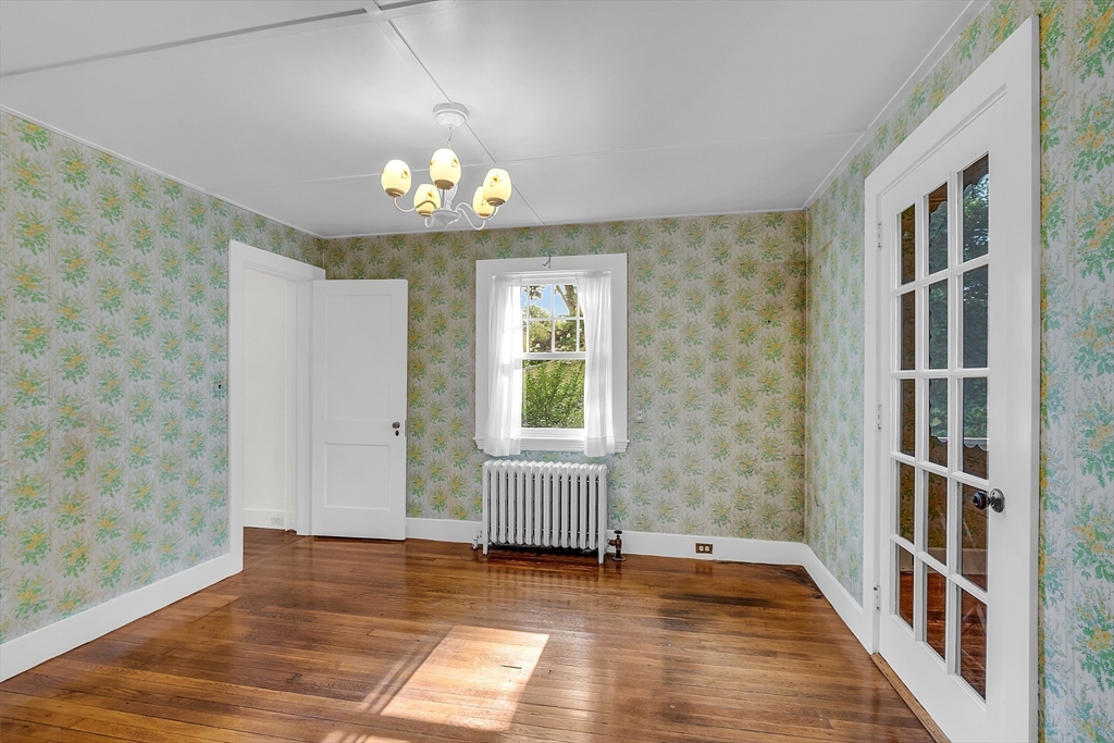 42 Locust Street Marblehead, MA 01945 - Photo 15 of 42 a view of an empty room with a window