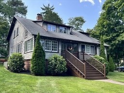 42 Locust Street Marblehead, MA 01945 - Photo 2 of 42 a view of a house with a yard and a wooden deck