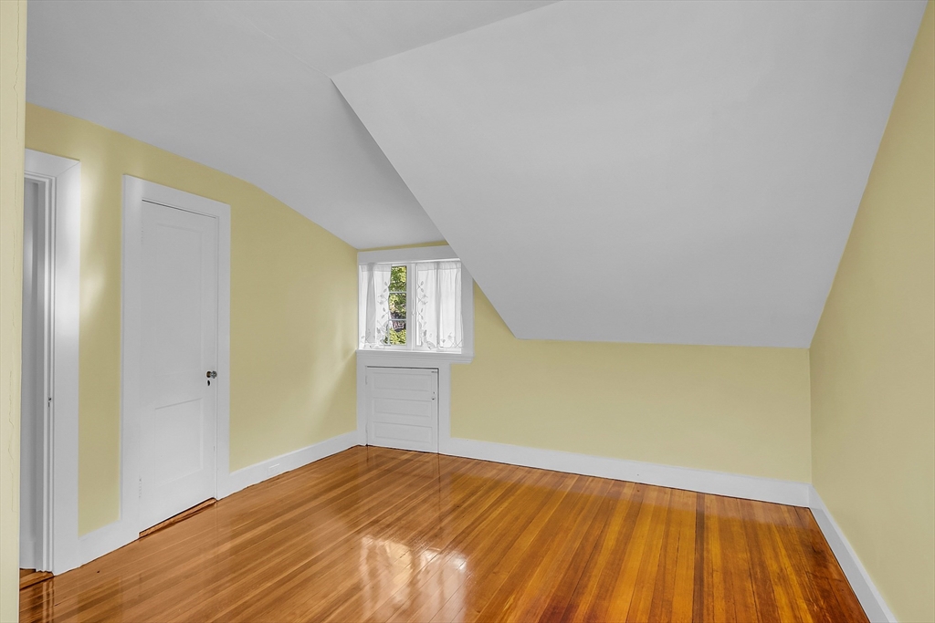 42 Locust Street Marblehead, MA 01945 - Photo 26 of 42 a view of empty room with wooden floor and fan
