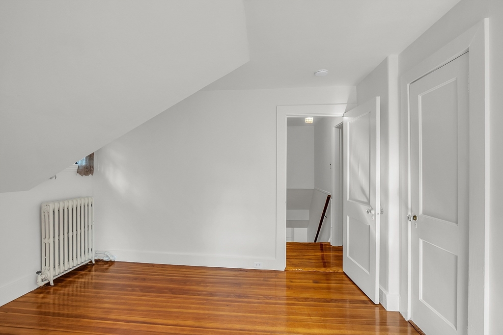 42 Locust Street Marblehead, MA 01945 - Photo 27 of 42 a view of empty room with wooden floor
