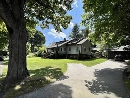 42 Locust Street Marblehead, MA 01945 - Photo 40 of 42 a front view of a house with a yard
