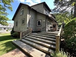 42 Locust Street Marblehead, MA 01945 - Photo 4 of 42 a view of a house with a yard balcony and stairs