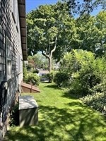 42 Locust Street Marblehead, MA 01945 - Photo 7 of 42 a view of a yard with plants