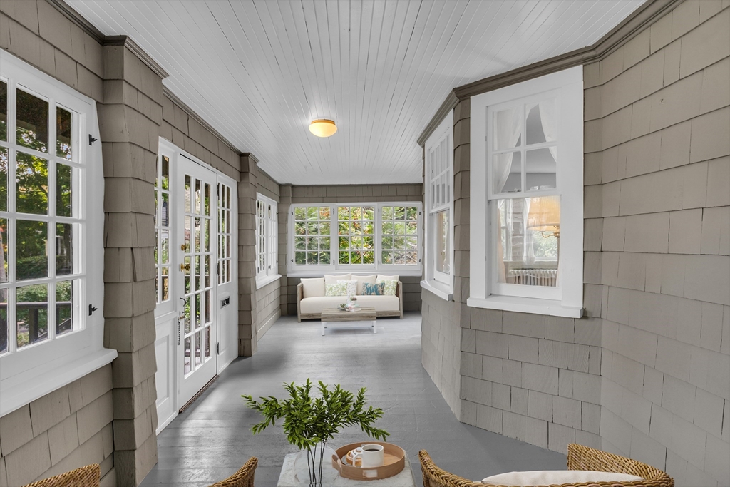 42 Locust Street Marblehead, MA 01945 - Photo 10 of 42 a living room with furniture and large windows