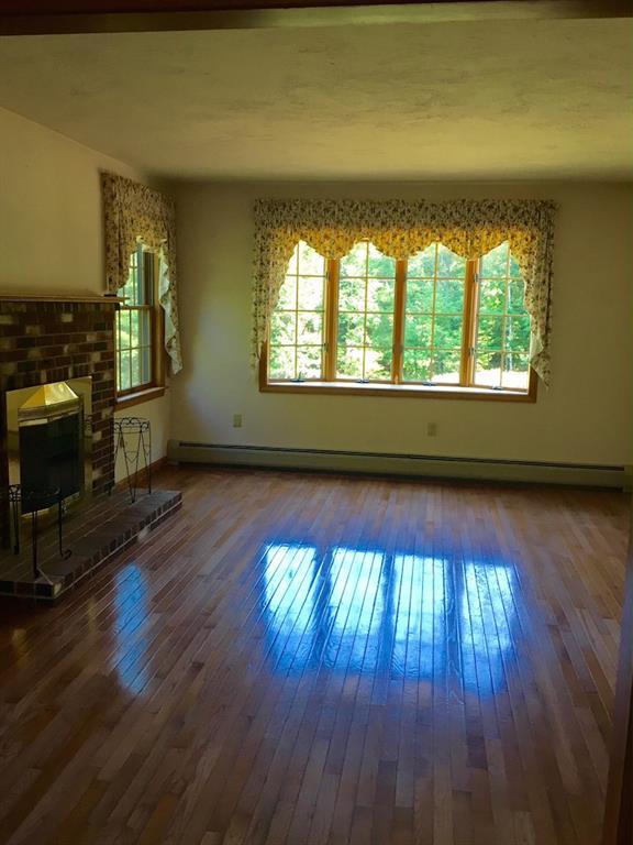 192 Maple Ridge Road South China, ME 04358 - Photo 12 of 24 Formal living room with fireplace