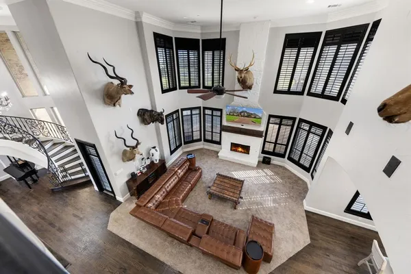 a view of staircase with furniture and rug