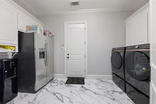 a view of a swimming pool with a patio