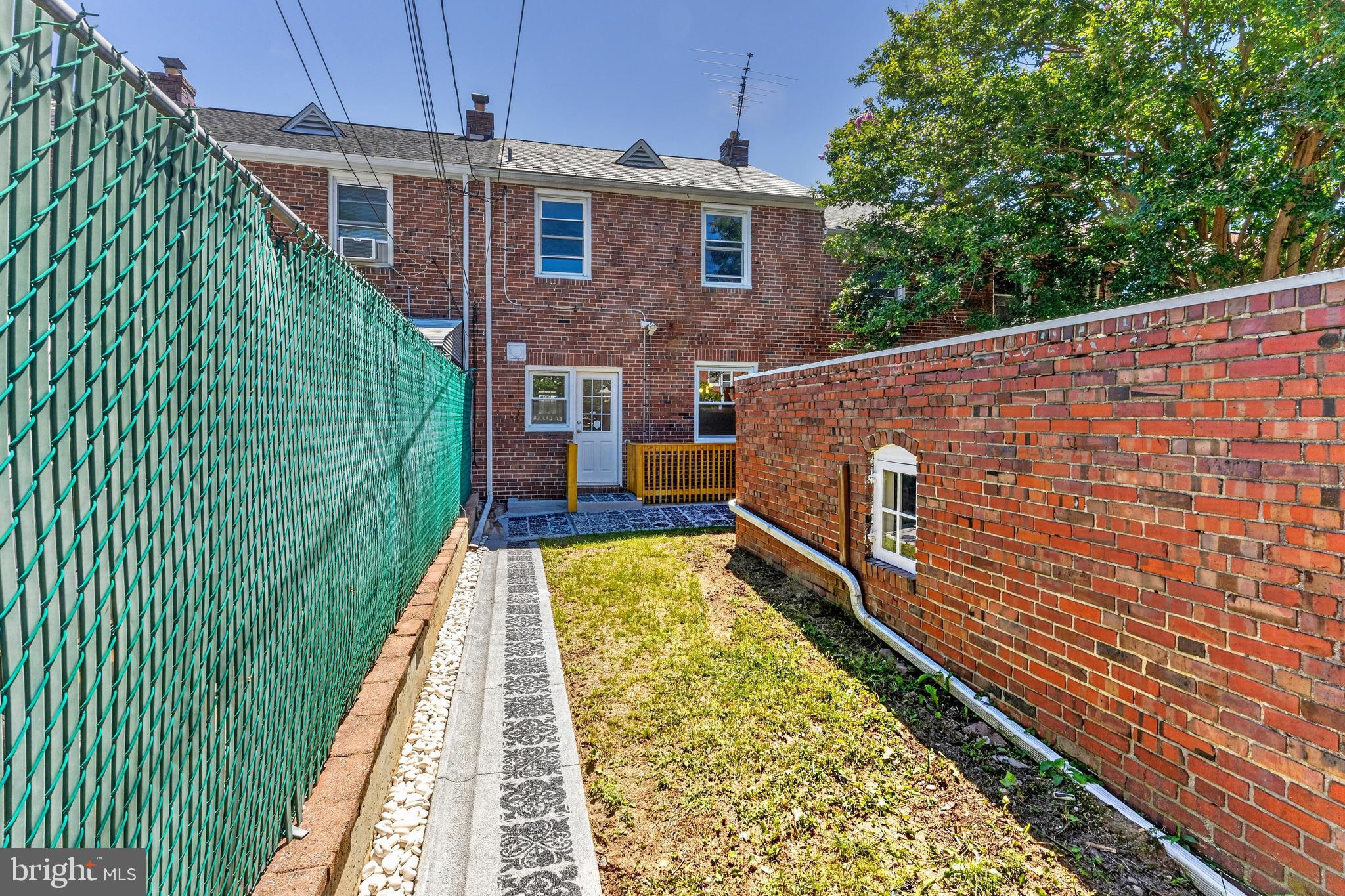 3906 Yolando Road Baltimore, MD 21218 - Photo 24 of 30 a aerial view of a house with a swimming pool