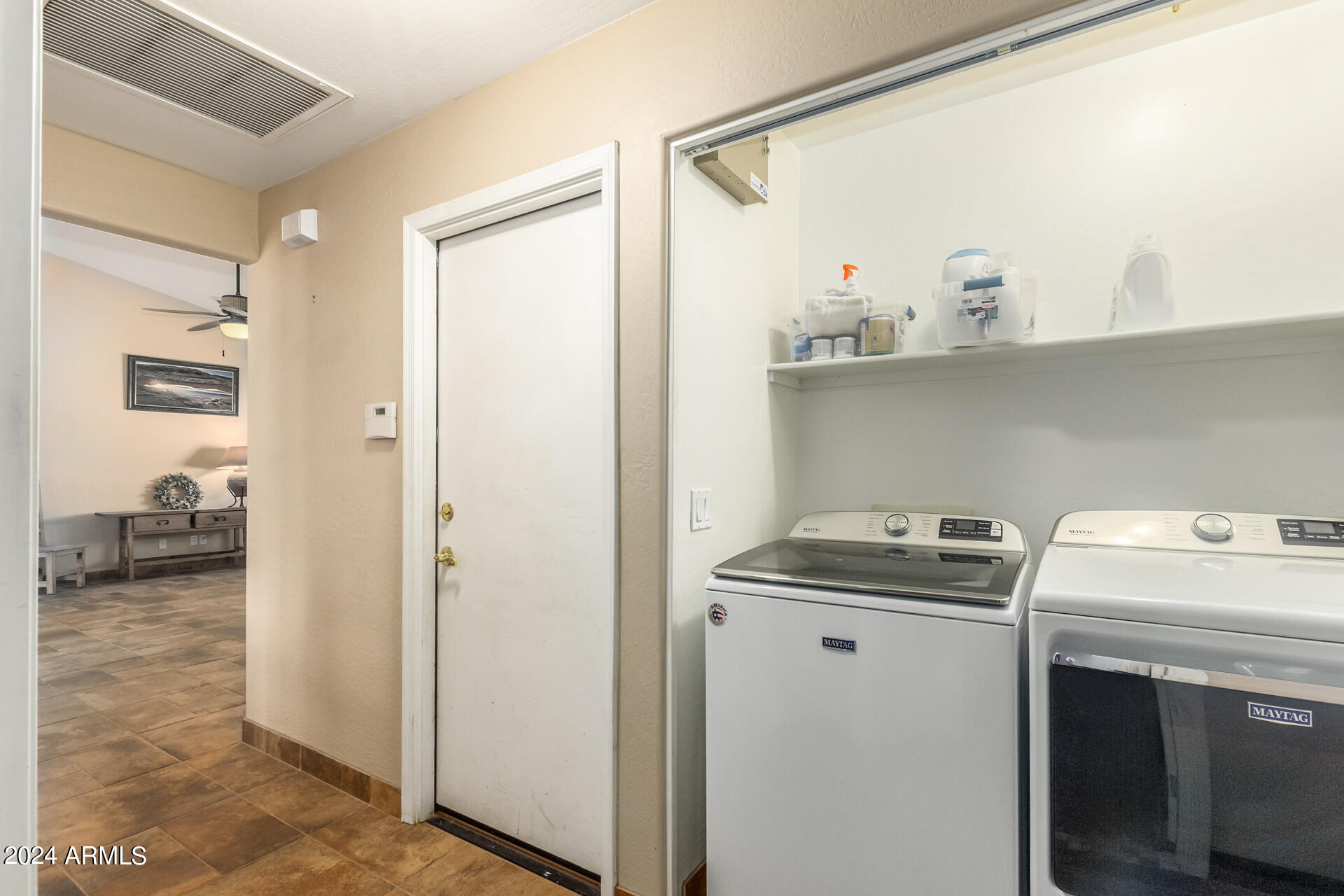 57 North Roadrunner Road Apache Junction, AZ 85119 - Photo 24 of 44 a view of utility room with washer and dryer