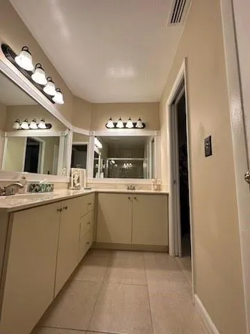 a view of a lake with houses in the back yard