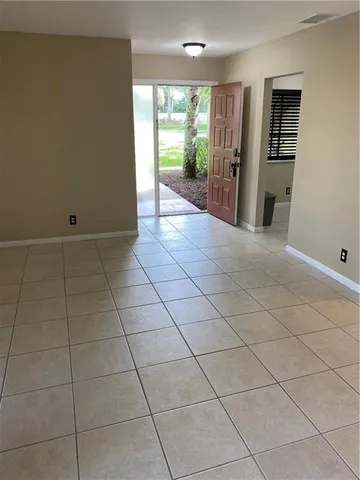 a kitchen with a stove and a refrigerator