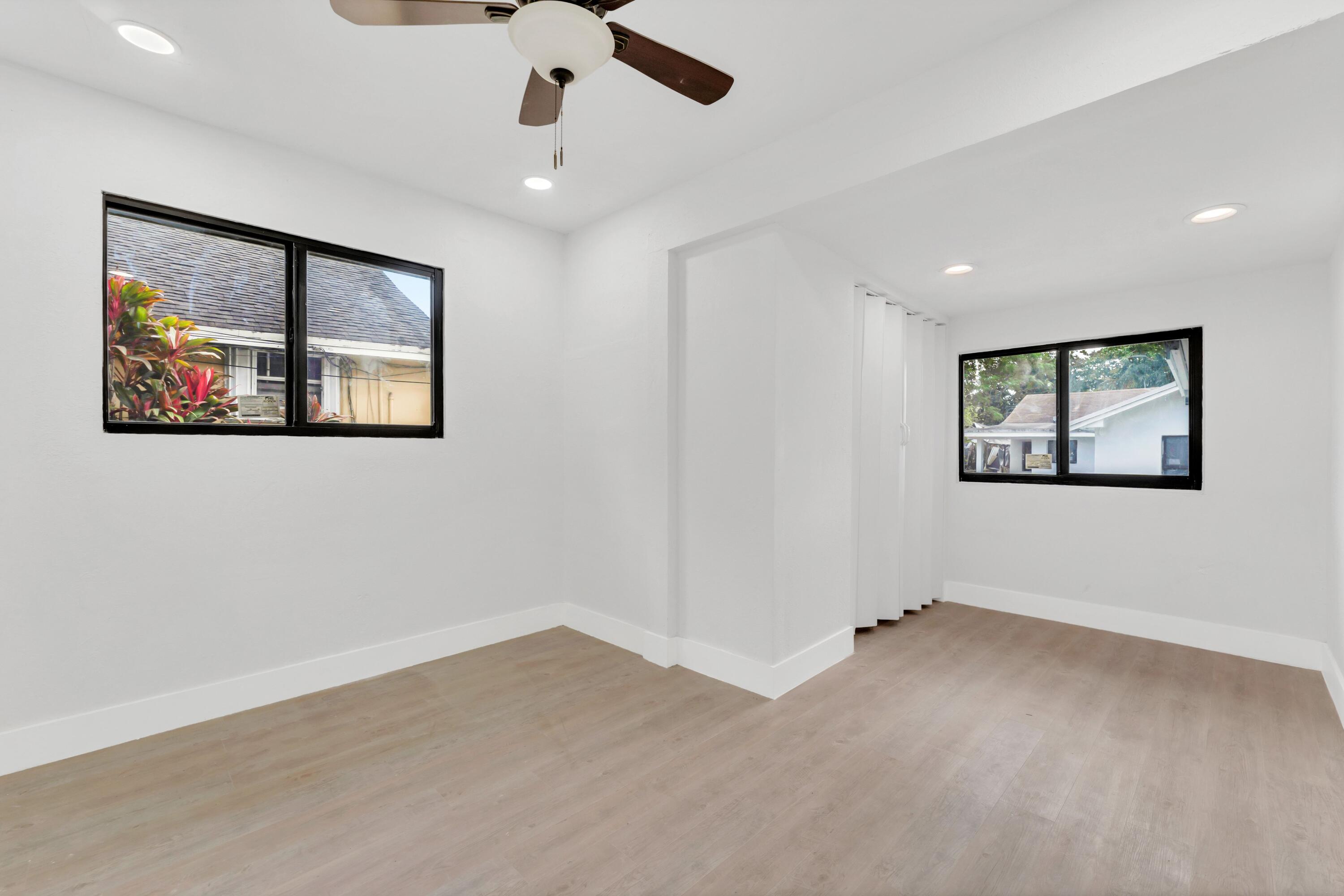 2428 Northwest 28th Street Miami, FL 33142 - Photo 13 of 19 a view of an empty room with a window