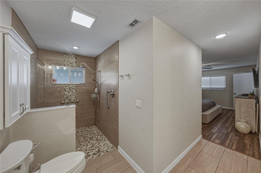 7435 Kilbride Court Weeki Wachee, FL 34613 - Photo 44 of 67 a bathroom with a sink and a mirror