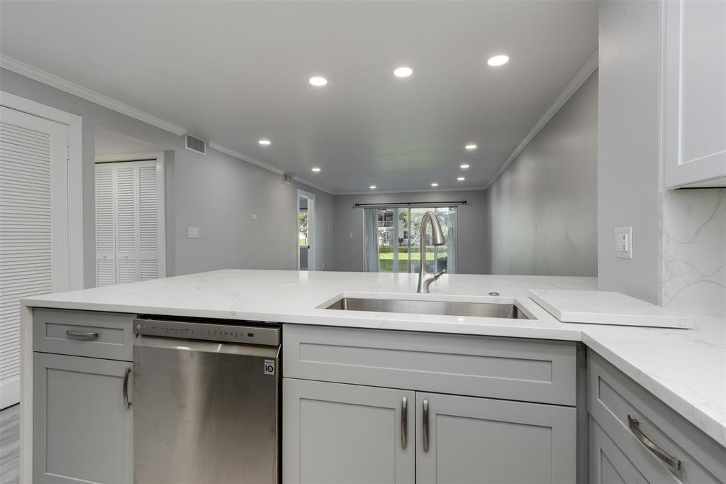 9856 Marina Boulevard, Unit 1314 Boca Raton, FL 33428 - Photo 11 of 43 a bathroom with a sink a vanity and a mirror
