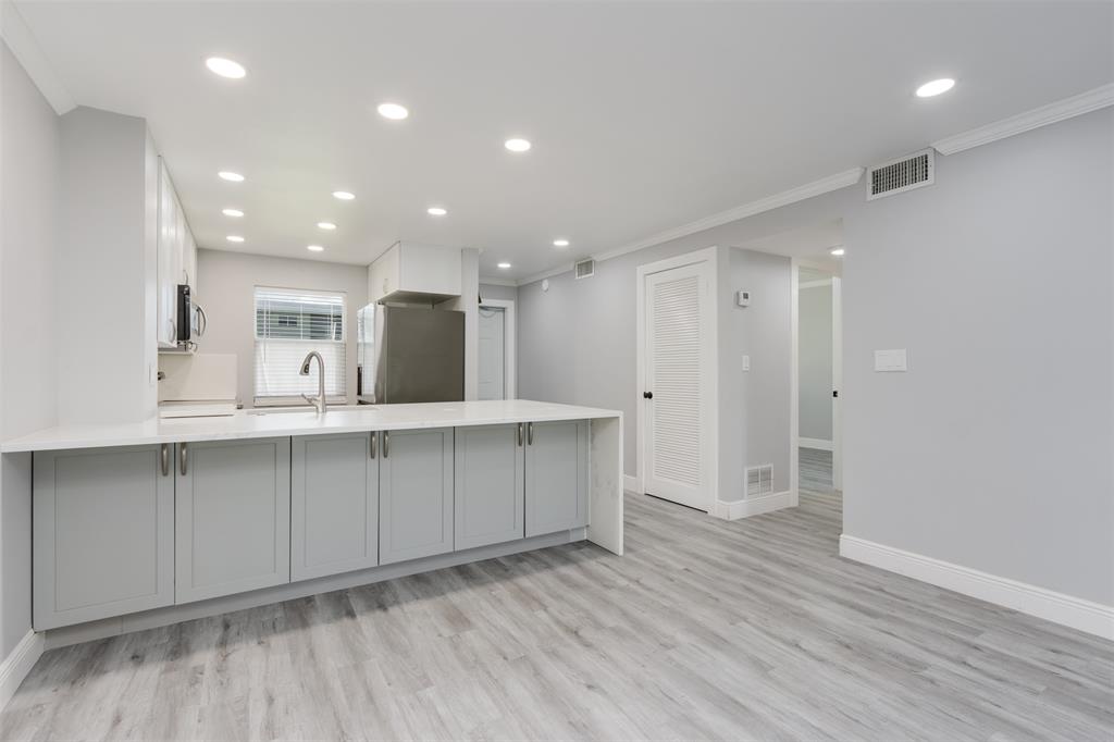 9856 Marina Boulevard, Unit 1314 Boca Raton, FL 33428 - Photo 13 of 43 a view of kitchen with wooden floor