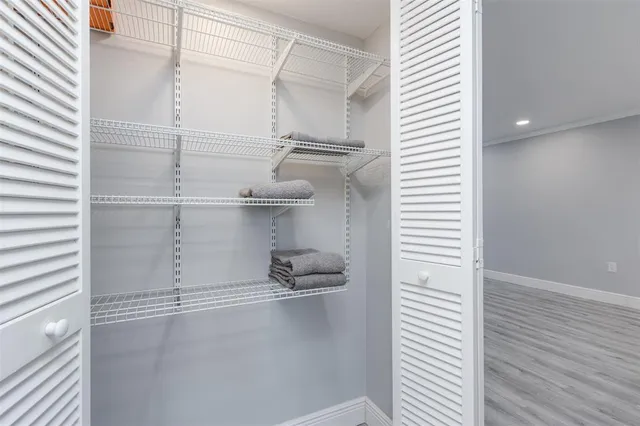 a view of a room with racks on the wall