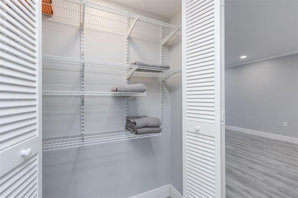 9856 Marina Boulevard, Unit 1314 Boca Raton, FL 33428 - Photo 32 of 43 a view of a room with racks on the wall