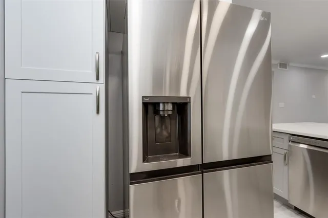 a view of a bathroom with mirror