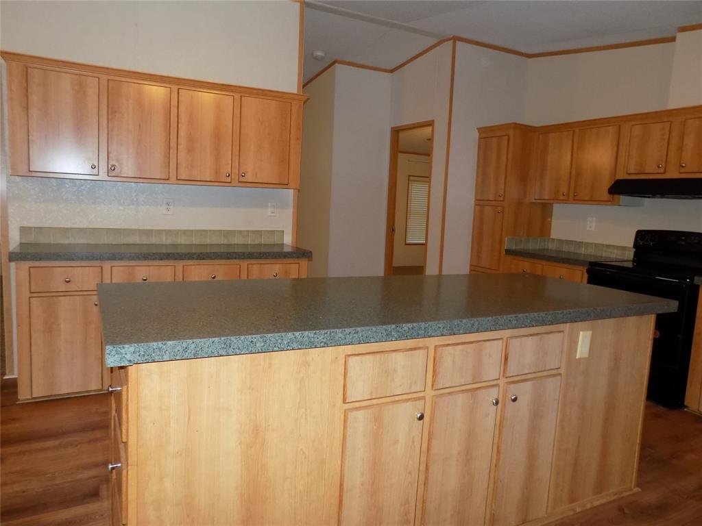 12792 Highway 199 Poolville, TX 76487 - Photo 12 of 24 You can appreciate the large kitchen island