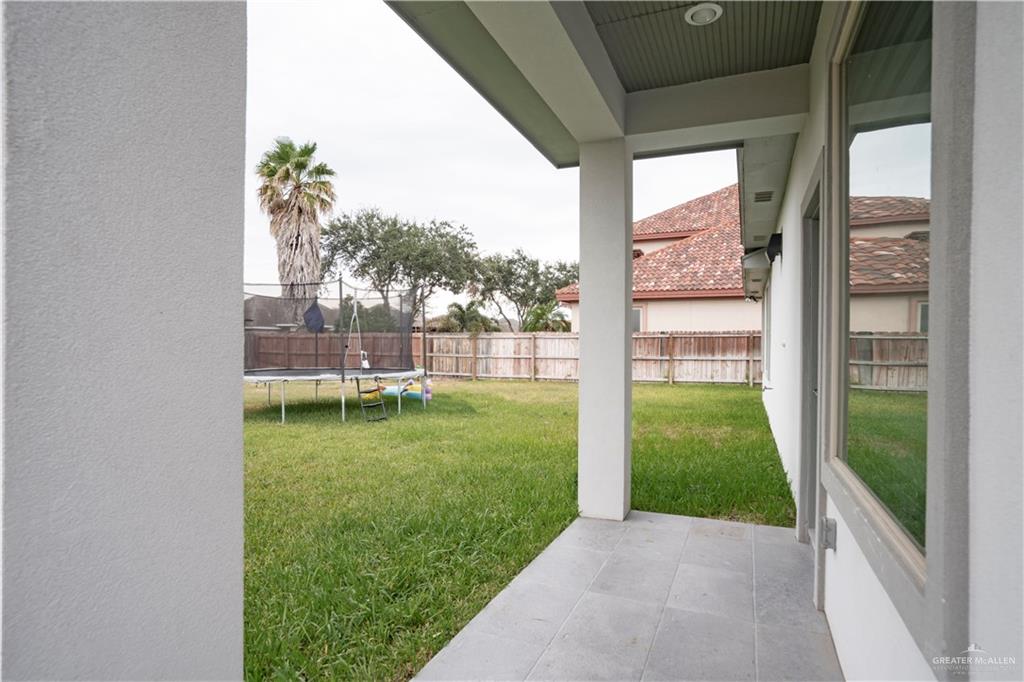 2008 South Erica Street Pharr, TX 78577 - Photo 24 of 25 a porch with a yard