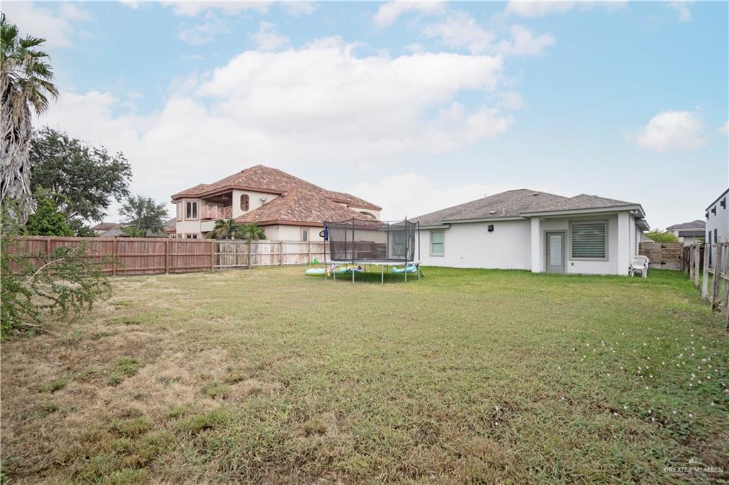 2008 South Erica Street Pharr, TX 78577 - Photo 25 of 25 a front view of a house with a yard and lake view