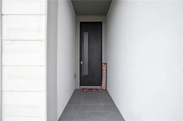 a view of a small space with wooden floor