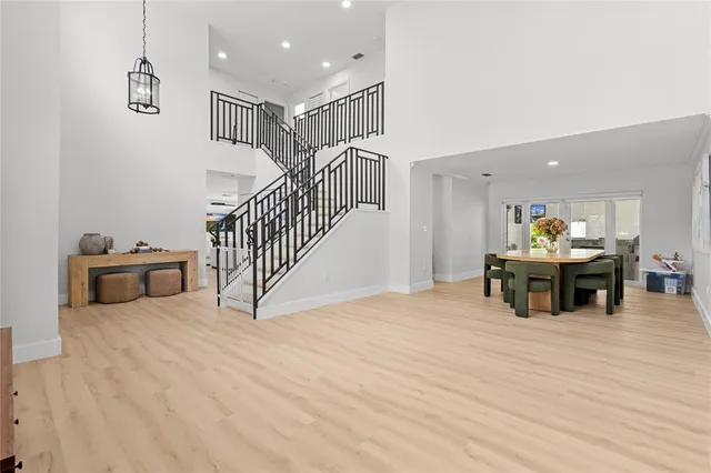a view of kitchen with furniture and windows