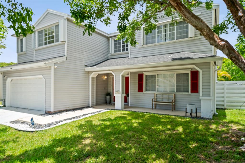 14908 Southwest 143rd Place Miami, FL 33186 - Photo 3 of 45 a view of a house with backyard