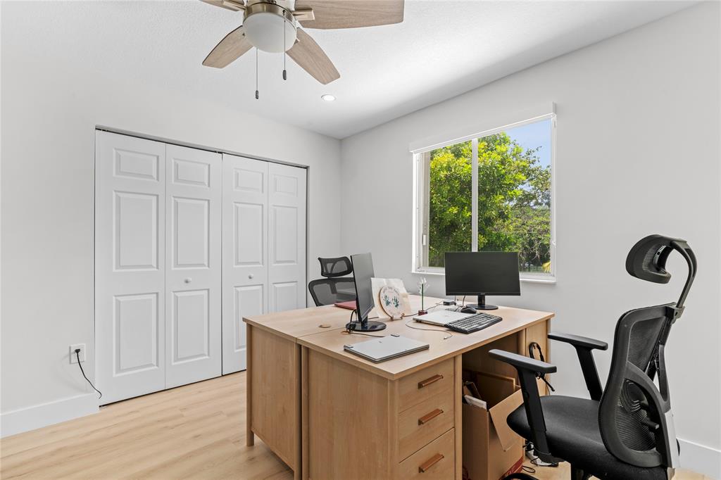 14908 Southwest 143rd Place Miami, FL 33186 - Photo 44 of 45 a view of a workspace with furniture and window