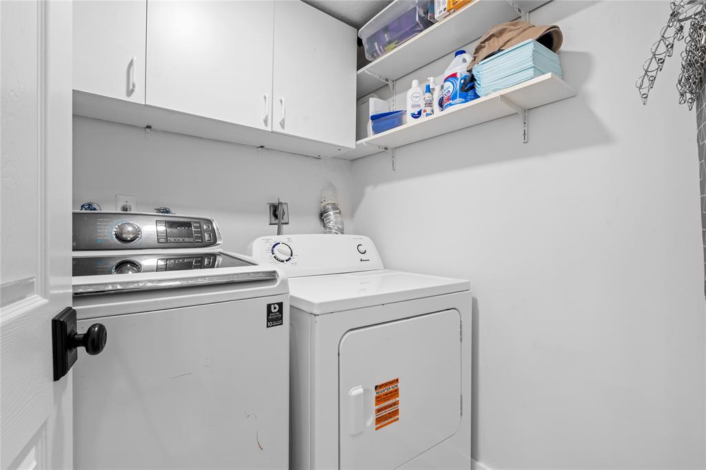 14908 Southwest 143rd Place Miami, FL 33186 - Photo 45 of 45 a utility room with dryer and washer