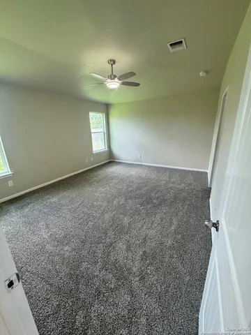 wooden view of a room with an empty space