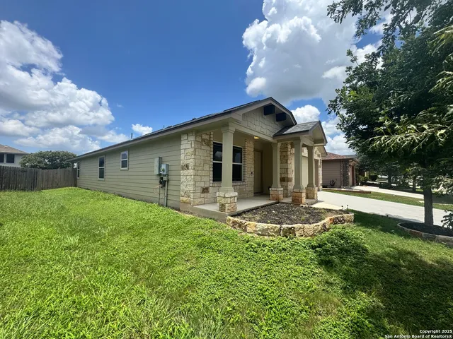 a front view of house with yard