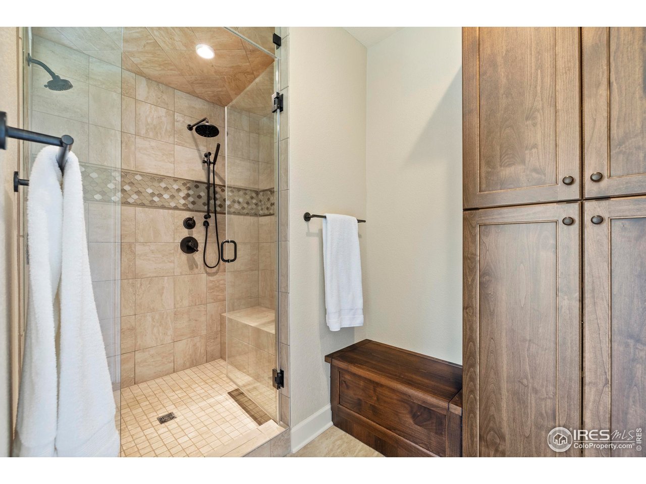 793 Richards Lake Road Fort Collins, CO 80524 - Photo 22 of 40 a bathroom with a shower and a glass door
