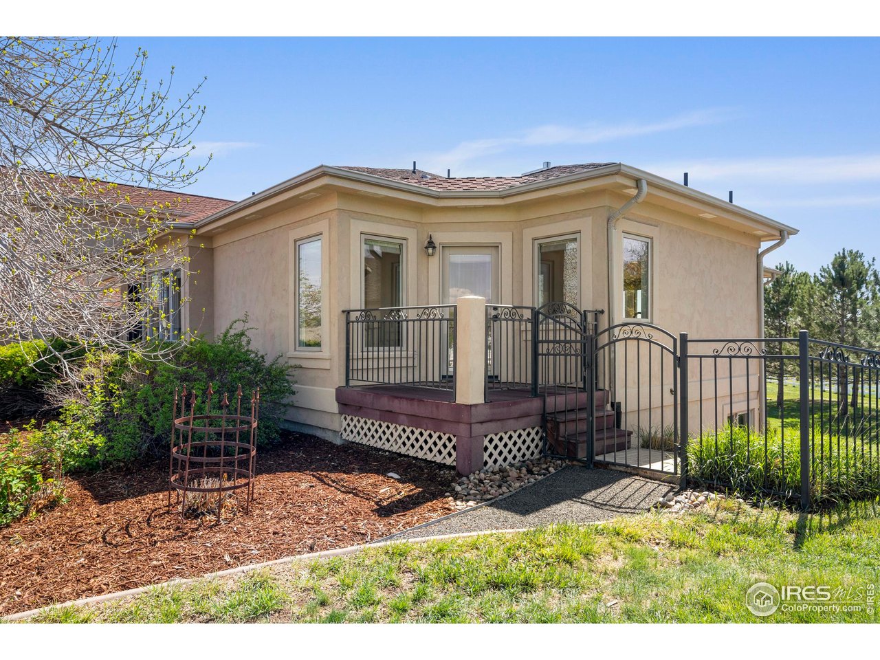 793 Richards Lake Road Fort Collins, CO 80524 - Photo 23 of 40 a view of a house with a small yard and plants