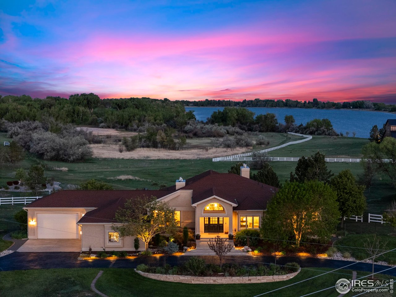 793 Richards Lake Road Fort Collins, CO 80524 - Photo 3 of 40 a view of a town with palm trees and a yard