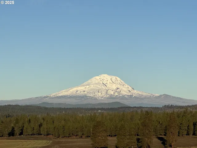 a view of mountain with lake view