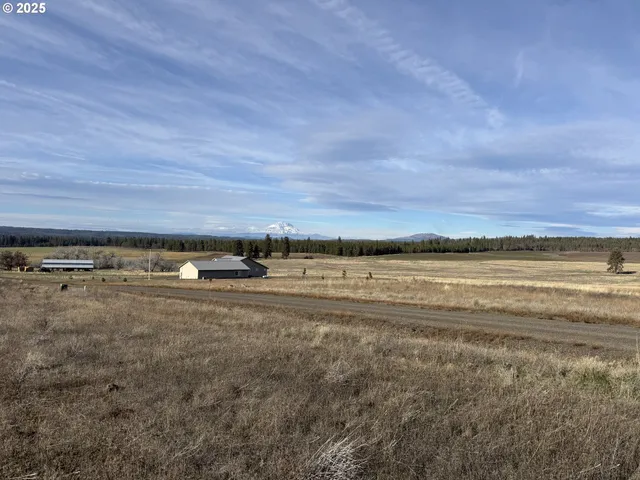a view of an ocean and mountain