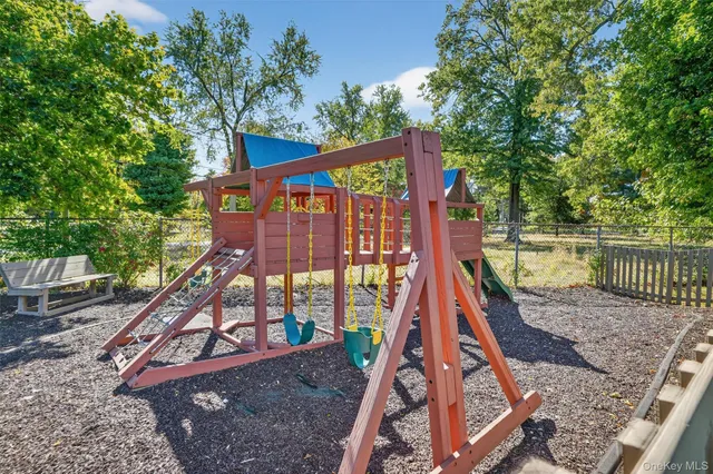 a view of a park with a small deck