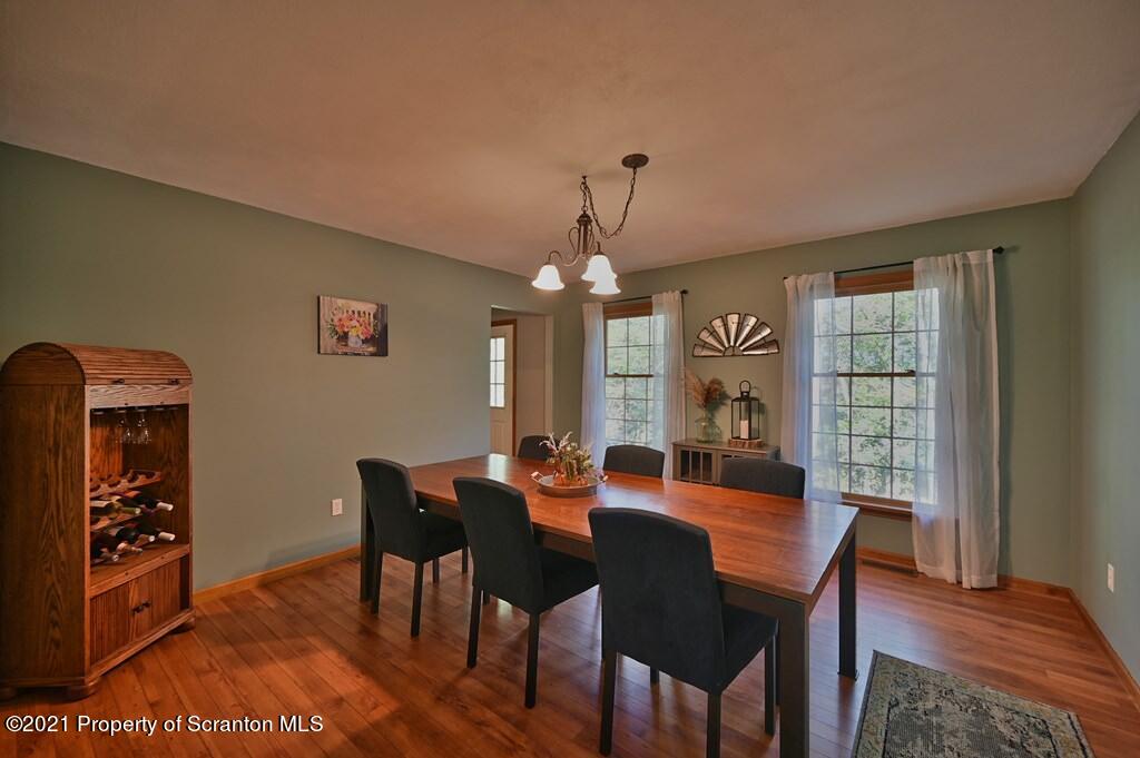 113 Marcy Road Tunkhannock, PA 18657 - Photo 13 of 82 a view of a a dining room with furniture window and wooden floor