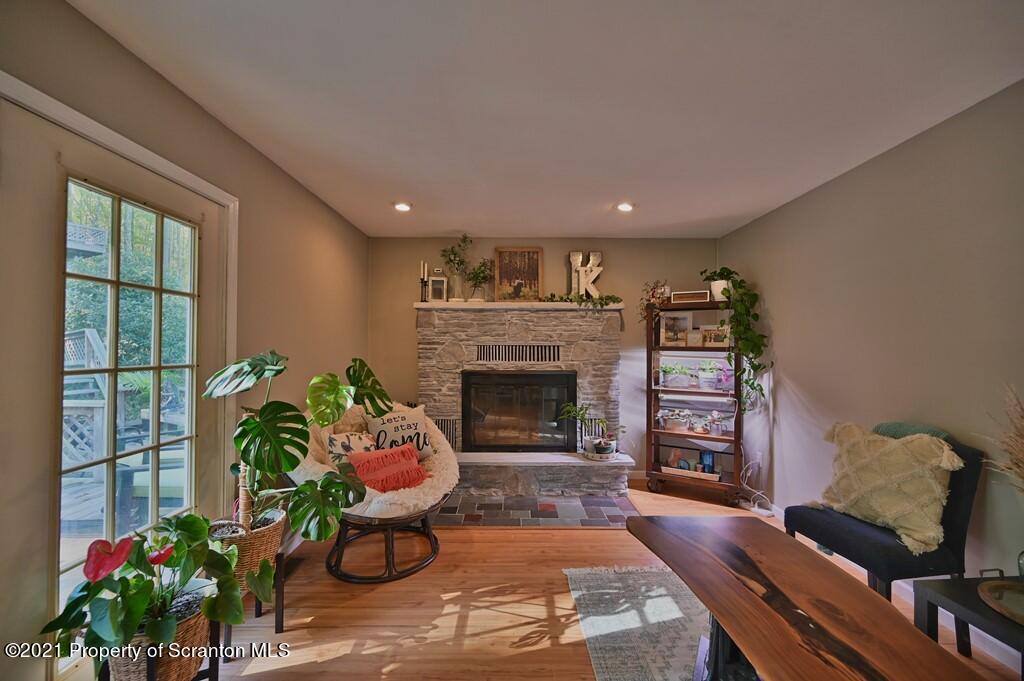 113 Marcy Road Tunkhannock, PA 18657 - Photo 16 of 82 a living room with furniture and a fireplace