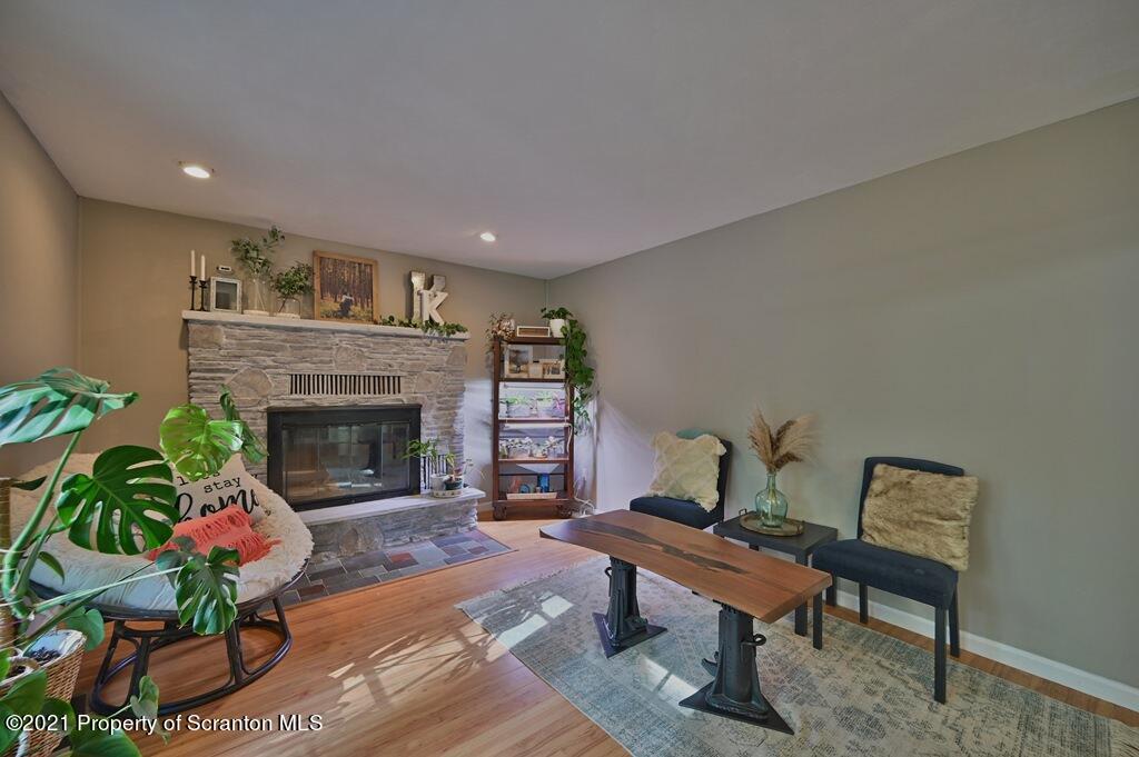 113 Marcy Road Tunkhannock, PA 18657 - Photo 17 of 82 a living room with furniture and a fireplace
