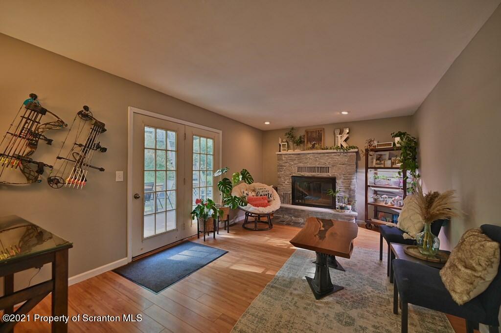 113 Marcy Road Tunkhannock, PA 18657 - Photo 18 of 82 a living room with furniture a window and a fireplace