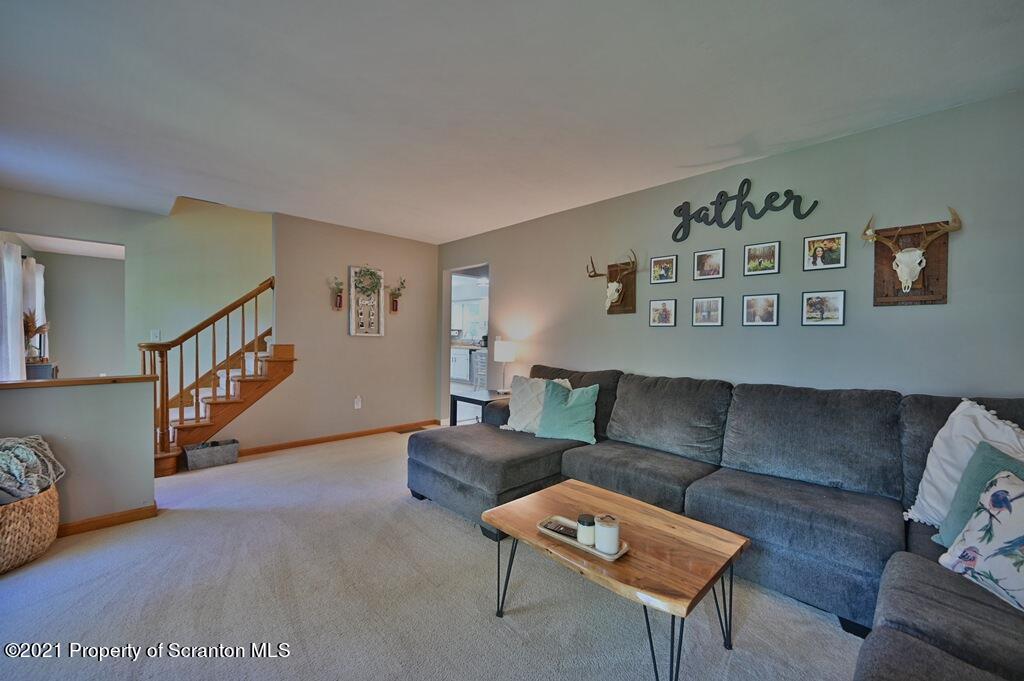 113 Marcy Road Tunkhannock, PA 18657 - Photo 20 of 82 a living room with furniture and a wooden floor