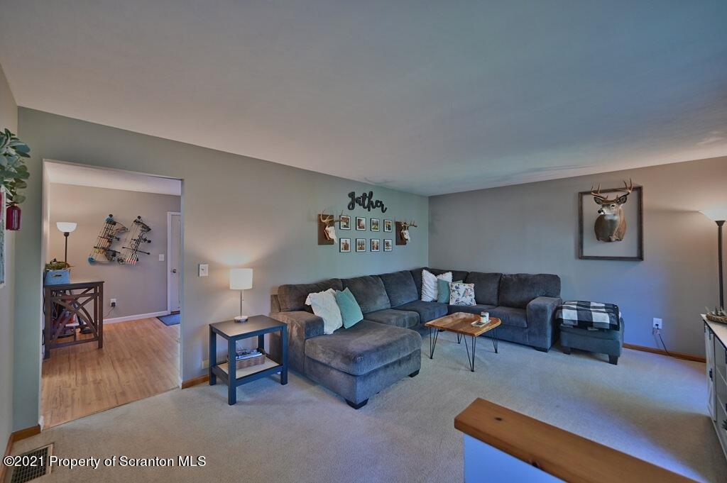 113 Marcy Road Tunkhannock, PA 18657 - Photo 21 of 82 a living room with furniture and a couch