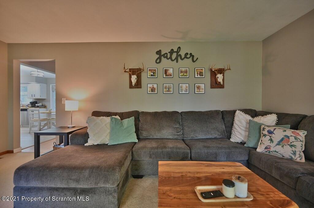 113 Marcy Road Tunkhannock, PA 18657 - Photo 23 of 82 a living room with furniture and night stand