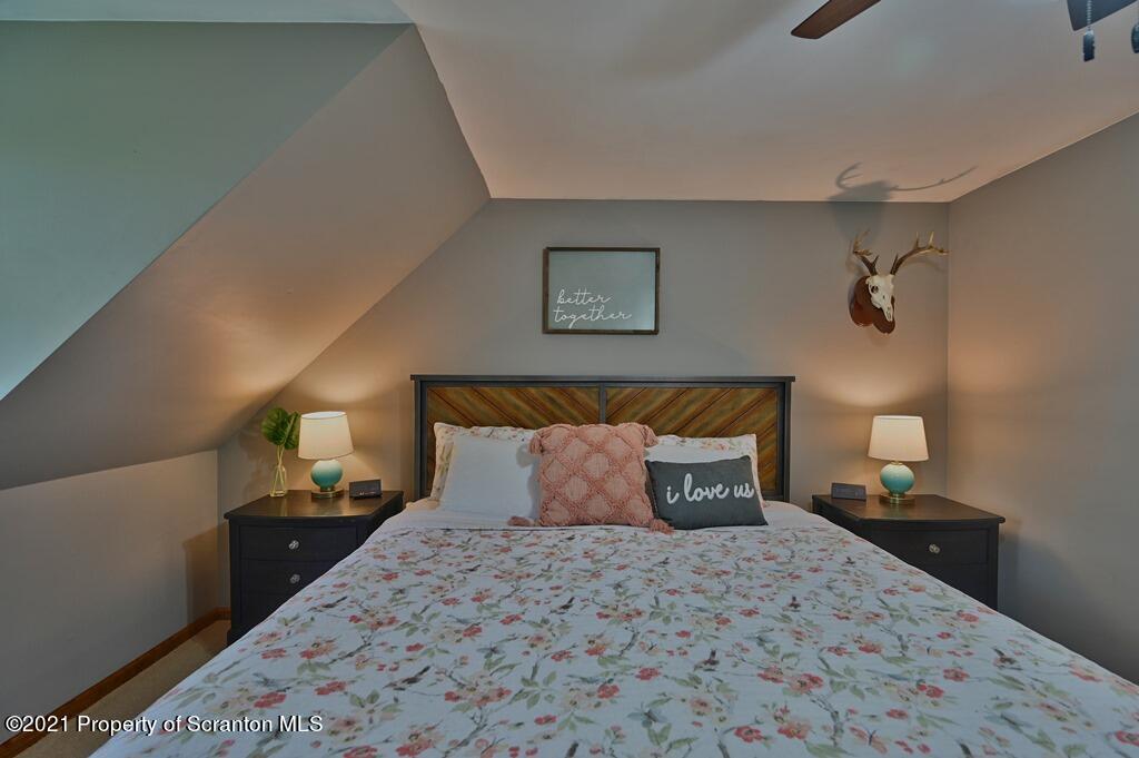 113 Marcy Road Tunkhannock, PA 18657 - Photo 35 of 82 a bedroom with a bed and night stand