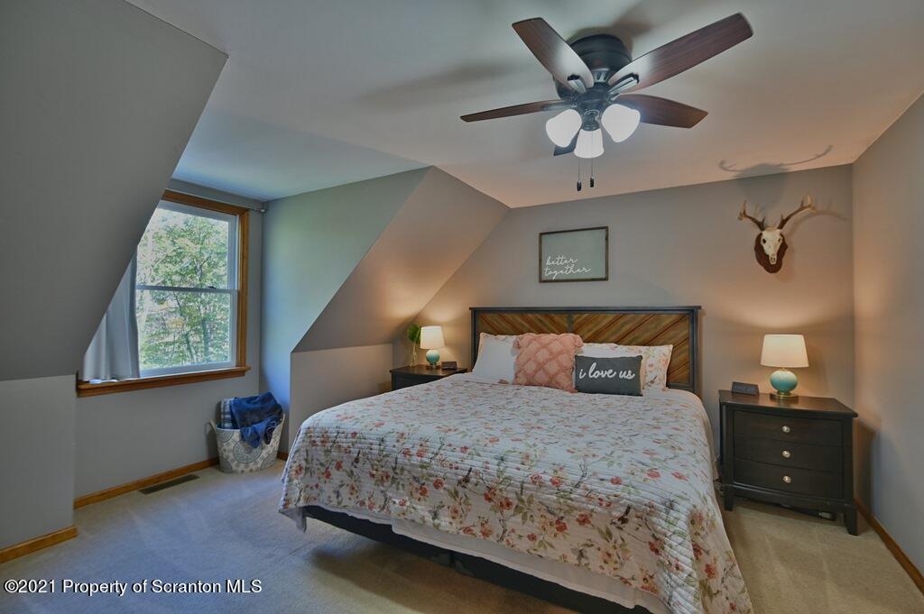 113 Marcy Road Tunkhannock, PA 18657 - Photo 38 of 82 a bedroom with a bed and window