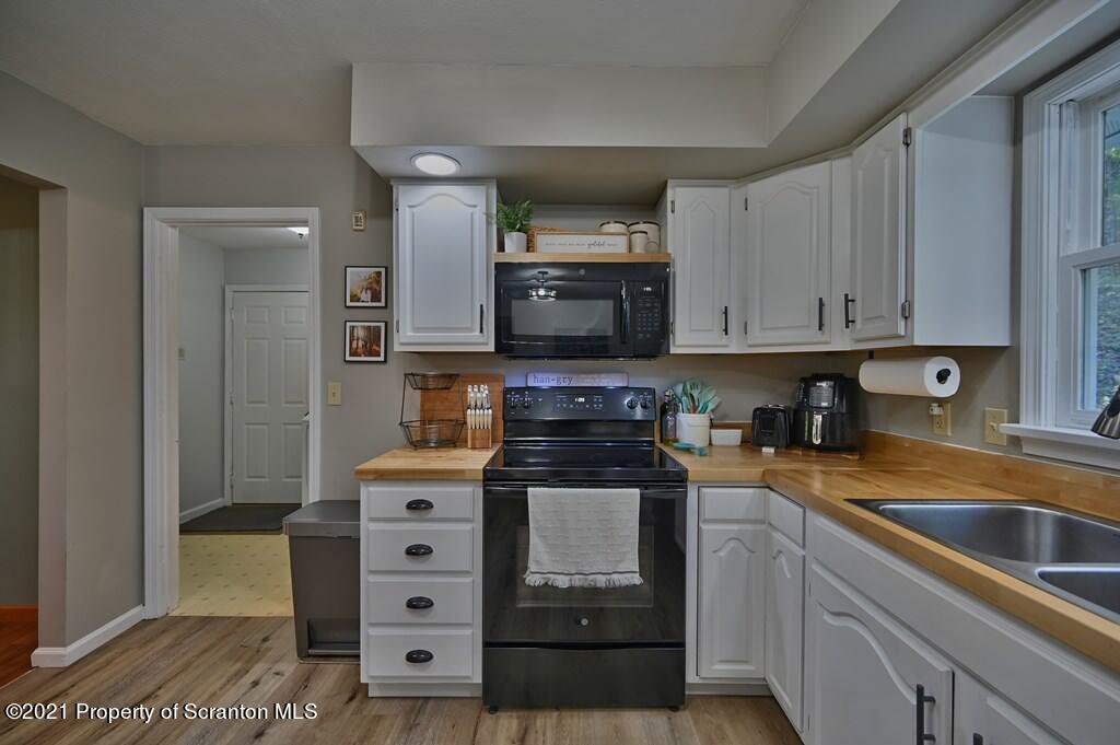 113 Marcy Road Tunkhannock, PA 18657 - Photo 4 of 82 a kitchen with stainless steel appliances granite countertop a sink and a stove