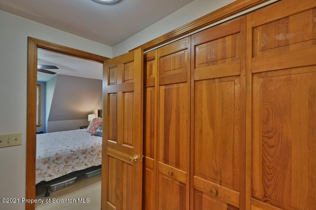 113 Marcy Road Tunkhannock, PA 18657 - Photo 47 of 82 a bedroom with a bed and a walk in closet